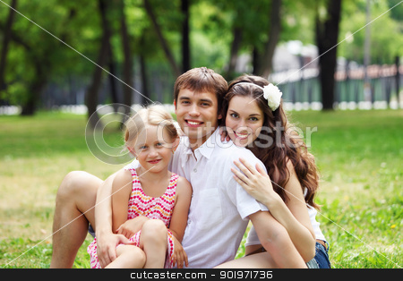 To use this stock image in your creative project, please select the size you need over to the right and click the "Add to Cart" button.
Your downloaded image will come with the Cutcaster watermark removed so don’t worry about the watermark you see on this page. happy family having fun outdoors stock photo, Young Family Outdoors on the grass in Park in summer by Sergey Nivens