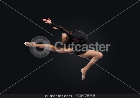 Young woman in gymnast suit posing Young woman in gymnast suit posing stock photo, Young cute woman in gymnast suit show athletic skill on black background by Sergey Nivens
