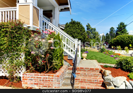 To use this stock image in your creative project, please select the size you need over to the right and click the "Add to Cart" button.
Your downloaded image will come with the Cutcaster watermark removed so don’t worry about the watermark you see on this page. House entrance stairs from brick and roses with the street view. stock photo, Nice house enrance with brick stairs, roses and stree view. by iriana88w