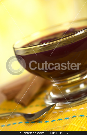 To use this stock image in your creative project, please select the size you need over to the right and click the "Add to Cart" button.
Your downloaded image will come with the Cutcaster watermark removed so don’t worry about the watermark you see on this page. Peruvian Dessert Called Mazamorra Morada stock photo, Popular Peruvian dessert called Mazamorra Morada (made out of purple corn) with cinnamon sticks and spoon on the side (Selective Focus, Focus on the front of the bowl) by Ildiko Papp