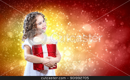 To use this stock image in your creative project, please select the size you need over to the right and click the "Add to Cart" button.
Your downloaded image will come with the Cutcaster watermark removed so don’t worry about the watermark you see on this page. Happy girl opening gift box stock photo, A cute young girl holding a christmas gift, dark background with christmas light bokeh by Sergey Nivens