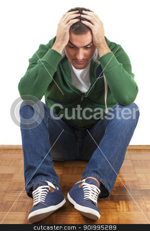 To use this stock image in your creative project, please select the size you need over to the right and click the "Add to Cart" button.
Your downloaded image will come with the Cutcaster watermark removed so don’t worry about the watermark you see on this page. Depressed stock photo, Young depressed male sitting holding his head with both hands by Jenella