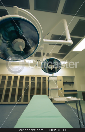 To use this stock image in your creative project, please select the size you need over to the right and click the "Add to Cart" button.
Your downloaded image will come with the Cutcaster watermark removed so don’t worry about the watermark you see on this page. operating room stock photo, Hospital operating room by digidreamgrafix.com