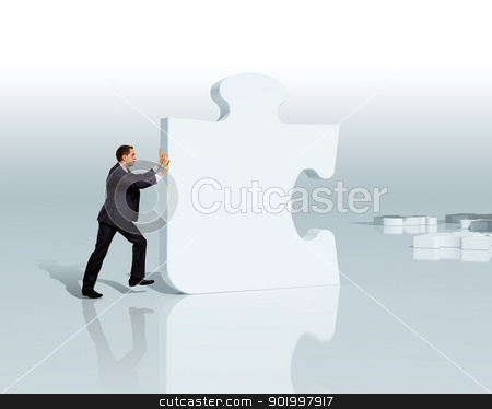 Businessman with a puzzle pieces Businessman with a puzzle pieces stock photo, Businessman with a puzzle pieces on the background by Sergey Nivens