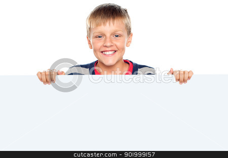 To use this stock image in your creative project, please select the size you need over to the right and click the "Add to Cart" button.
Your downloaded image will come with the Cutcaster watermark removed so don’t worry about the watermark you see on this page. Stylish boy standing behind big blank banner ad stock photo, Stylish boy standing behind big blank banner ad. Facing camera and smiling by Ishay Botbol