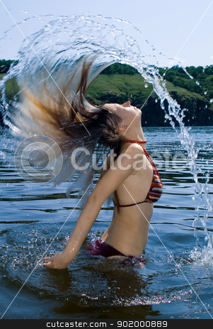 To use this stock image in your creative project, please select the size you need over to the right and click the "Add to Cart" button.
Your downloaded image will come with the Cutcaster watermark removed so don’t worry about the watermark you see on this page. The young woman bathes in the river stock photo, The young woman bathes in the river by Sergii Sukhorukov
