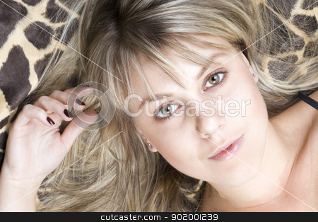 Portrait of the young blonde lies on a bed portrait of the young blonde lies on a bed stock photo, portrait of the young blonde lies on a bed by Sergii Sukhorukov