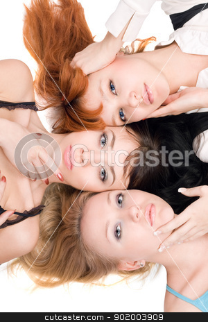 To use this stock image in your creative project, please select the size you need over to the right and click the "Add to Cart" button.
Your downloaded image will come with the Cutcaster watermark removed so don’t worry about the watermark you see on this page. Three beautiful women stock photo, Portrait of three beautiful women lying on white background by Sergii Sukhorukov