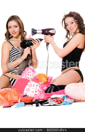 To use this stock image in your creative project, please select the size you need over to the right and click the "Add to Cart" button.
Your downloaded image will come with the Cutcaster watermark removed so don’t worry about the watermark you see on this page. Two playful young girlfriends with hair dryers stock photo, Two playful young girlfriends with hair dryers. Isolated by Sergii Sukhorukov