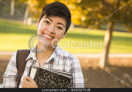 To use this stock image in your creative project, please select the size you need over to the right and click the "Add to Cart" button.
Your downloaded image will come with the Cutcaster watermark removed so don’t worry about the watermark you see on this page. Portrait of a Pretty Mixed Race Female Student Holding Books stock photo, Outdoor Portrait of a Pretty Mixed Race Female Student Holding Books on a Sunny Afternoon. by Andy Dean