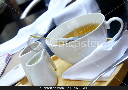 Tea time - green organic tea, white tea service Tea time - green organic tea, white tea service stock photo, Tea time - green organic tea, white tea service, wooden try, white tablecloth by Tatiana Mihaliova