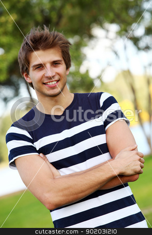 To use this stock image in your creative project, please select the size you need over to the right and click the "Add to Cart" button.
Your downloaded image will come with the Cutcaster watermark removed so don’t worry about the watermark you see on this page. Portrait of young cute man in park stock photo, Portrait of young and smiling cute man in park by yekostock