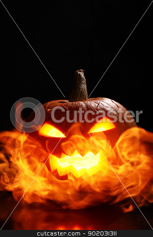 To use this stock image in your creative project, please select the size you need over to the right and click the "Add to Cart" button.
Your downloaded image will come with the Cutcaster watermark removed so don’t worry about the watermark you see on this page. Halloween pumpkin in fire stock photo, halloween pumpkin in fire over a black background by yekostock