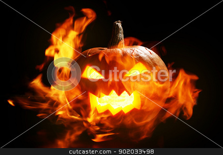 To use this stock image in your creative project, please select the size you need over to the right and click the "Add to Cart" button.
Your downloaded image will come with the Cutcaster watermark removed so don’t worry about the watermark you see on this page. Halloween pumpkin in fire stock photo, halloween pumpkin in fire over a black background by yekostock