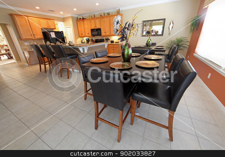 To use this stock image in your creative project, please select the size you need over to the right and click the "Add to Cart" button.
Your downloaded image will come with the Cutcaster watermark removed so don’t worry about the watermark you see on this page. Kitchen and Dining Area stock photo, An interior shot of a kitchen and dining area by Lucy Clark