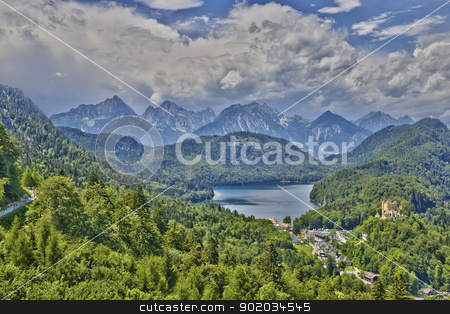 To use this stock image in your creative project, please select the size you need over to the right and click the "Add to Cart" button.
Your downloaded image will come with the Cutcaster watermark removed so don’t worry about the watermark you see on this page. Castle Hohenschwangau stock photo, Castle Hohenschwangau with alps and Alpsee in Bavaria by Reinhold Wittich