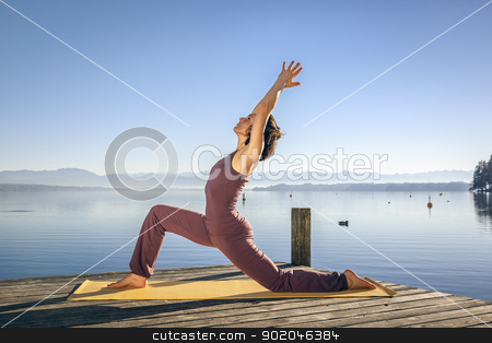 Yoga woman yoga woman stock photo, An image of a pretty woman doing yoga at the lake by Markus Gann