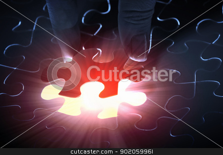 Puzzle pieces Puzzle pieces stock photo, puzzle piece coming down into its place by Sergey Nivens