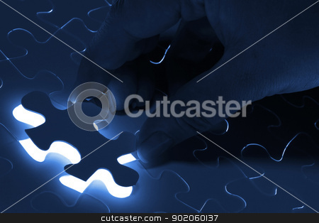 To use this stock image in your creative project, please select the size you need over to the right and click the "Add to Cart" button.
Your downloaded image will come with the Cutcaster watermark removed so don’t worry about the watermark you see on this page. Puzzle pieces stock photo, puzzle piece coming down into its place by Sergey Nivens