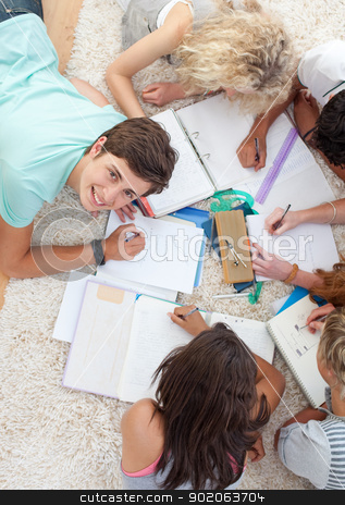 To use this stock image in your creative project, please select the size you need over to the right and click the "Add to Cart" button.
Your downloaded image will come with the Cutcaster watermark removed so don’t worry about the watermark you see on this page. Group of Teenagers studying together stock photo, Group of Teenagers lying on the ground studying together by Wavebreak Media