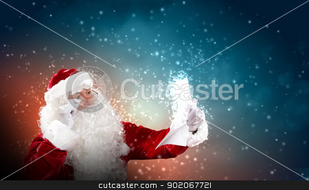 To use this stock image in your creative project, please select the size you need over to the right and click the "Add to Cart" button.
Your downloaded image will come with the Cutcaster watermark removed so don’t worry about the watermark you see on this page. Santa with christmas letter stock photo, Santa holding Christmas letters and looking at camera by Sergey Nivens