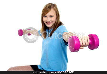 To use this stock image in your creative project, please select the size you need over to the right and click the "Add to Cart" button.
Your downloaded image will come with the Cutcaster watermark removed so don’t worry about the watermark you see on this page. Cute young girl stretching dumbbells sideways stock photo, Cute young girl stretching dumbbells sideways. Exercising for fitness. by Ishay Botbol