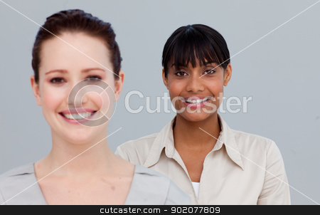 To use this stock image in your creative project, please select the size you need over to the right and click the "Add to Cart" button.
Your downloaded image will come with the Cutcaster watermark removed so don’t worry about the watermark you see on this page. Portrait of smiling businesswomen stock photo, Portrait of two beautiful businesswomen smiling at the camera by Wavebreak Media