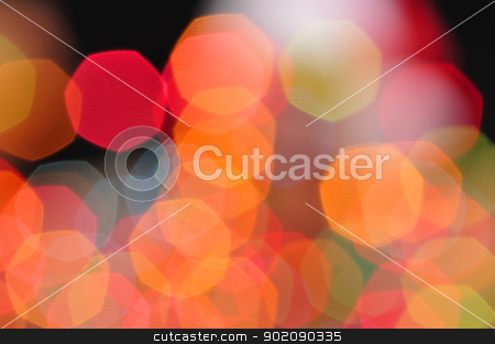 To use this stock image in your creative project, please select the size you need over to the right and click the "Add to Cart" button.
Your downloaded image will come with the Cutcaster watermark removed so don’t worry about the watermark you see on this page. Blurred colors stock photo, Colorful blurred Christmas lights in orange, red, blue and green form heptagon shapes by Chad Zuber