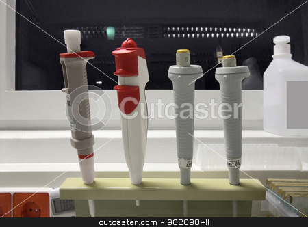 To use this stock image in your creative project, please select the size you need over to the right and click the "Add to Cart" button.
Your downloaded image will come with the Cutcaster watermark removed so don’t worry about the watermark you see on this page. various pipettes stock photo, some micropipettes in laboratory ambiance by prill