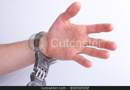 To use this stock image in your creative project, please select the size you need over to the right and click the "Add to Cart" button.
Your downloaded image will come with the Cutcaster watermark removed so don’t worry about the watermark you see on this page. A man in metal handcuffs on a grey background stock photo, A man in metal handcuffs on a grey background by michaklootwijk