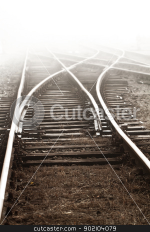 To use this stock image in your creative project, please select the size you need over to the right and click the "Add to Cart" button.
Your downloaded image will come with the Cutcaster watermark removed so don’t worry about the watermark you see on this page. Railway in fog stock photo, Railway in fog on station, outdoor landscape by Nneirda