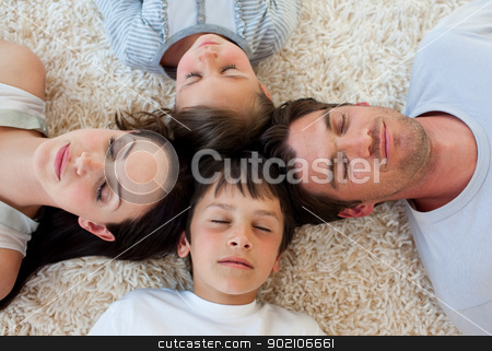 To use this stock image in your creative project, please select the size you need over to the right and click the "Add to Cart" button.
Your downloaded image will come with the Cutcaster watermark removed so don’t worry about the watermark you see on this page. Family sleeping on the floor stock photo, Family sleeping on the floor with heads together by Wavebreak Media