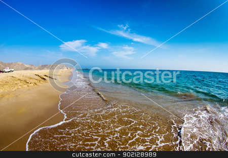 To use this stock image in your creative project, please select the size you need over to the right and click the "Add to Cart" button.
Your downloaded image will come with the Cutcaster watermark removed so don’t worry about the watermark you see on this page. sand beach stock photo, sand beach and blue sky by Vitaliy Pakhnyushchyy