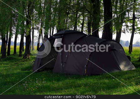 To use this stock image in your creative project, please select the size you need over to the right and click the "Add to Cart" button.
Your downloaded image will come with the Cutcaster watermark removed so don’t worry about the watermark you see on this page. camping tent stock photo, Green camping tent on green grassbackground by Vladyslav Danilin