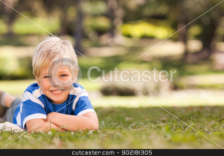 To use this stock image in your creative project, please select the size you need over to the right and click the "Add to Cart" button.
Your downloaded image will come with the Cutcaster watermark removed so don’t worry about the watermark you see on this page. Boy lying down in the park stock photo, Boy lying down in the park by Wavebreak Media