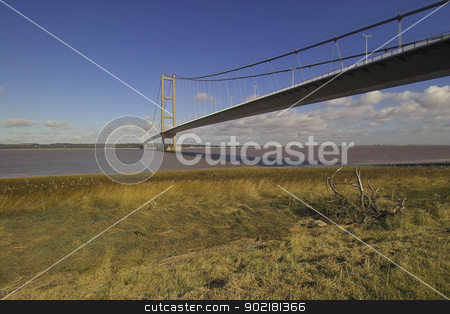 To use this stock image in your creative project, please select the size you need over to the right and click the "Add to Cart" button.
Your downloaded image will come with the Cutcaster watermark removed so don’t worry about the watermark you see on this page. Humber bridge stock photo, photo of the Humber bridge taken from the south bank of the river Humber by sijohnsen