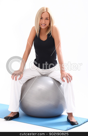 To use this stock image in your creative project, please select the size you need over to the right and click the "Add to Cart" button.
Your downloaded image will come with the Cutcaster watermark removed so don’t worry about the watermark you see on this page. Happy woman sitting on a fitness ball stock photo, Close up of happy and beautiful woman sitting on a fitness ball isolated on a white by yekostock