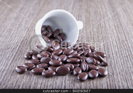 To use this stock image in your creative project, please select the size you need over to the right and click the "Add to Cart" button.
Your downloaded image will come with the Cutcaster watermark removed so don’t worry about the watermark you see on this page. Coffee stock photo, Close up of a cup of coffee with coffee beans by Fabio Alcini