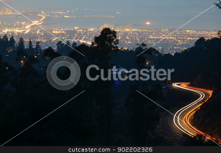 To use this stock image in your creative project, please select the size you need over to the right and click the "Add to Cart" button.
Your downloaded image will come with the Cutcaster watermark removed so don’t worry about the watermark you see on this page. Light Trails Above San Francisco Bay stock photo, Cars ascend and descend Skyline Blvd. looking over the San Francisco Bay. Cars enter and exit the city on the Bay Bridge in the upper left corner. In the distance you can see the lights of Alcatraz, Treasure and Yerba Buena Islands, and the Golden Gate Bridge. Taken off Grizzly Peak Blvd. by Avalon