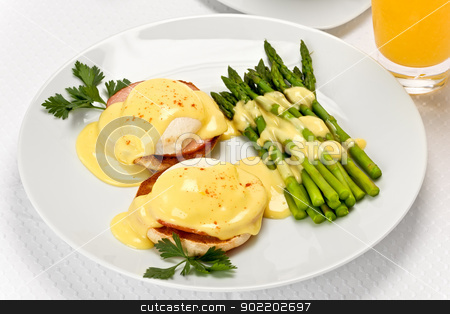 To use this stock image in your creative project, please select the size you need over to the right and click the "Add to Cart" button.
Your downloaded image will come with the Cutcaster watermark removed so don’t worry about the watermark you see on this page. Eggs Benedict stock photo, Two poached eggs, and canadian bacon, on an english muffin topped with hollandaise sauce with green asparagus on the side on white plate. by Glenn Price
