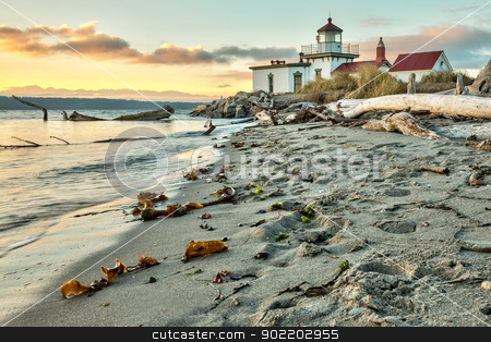 Sun set at West Point Lighthouse at Seattle Washington Sun set at West Point Lighthouse at Seattle Washington stock photo, Sun setting on the West Point Lighthouse at Seattle, Washington by Gary Ives