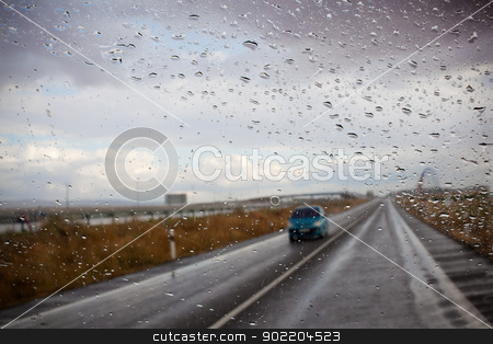 To use this stock image in your creative project, please select the size you need over to the right and click the "Add to Cart" button.
Your downloaded image will come with the Cutcaster watermark removed so don’t worry about the watermark you see on this page. road and rain stock photo, Abstract image of car and road Through the window by carloscastilla