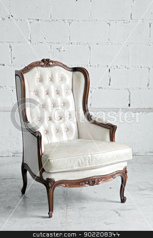 Sofa in vintage room sofa in vintage room stock photo, White genuine leather classical style sofa in vintage room by Vichaya Kiatying-Angsulee