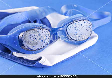 To use this stock image in your creative project, please select the size you need over to the right and click the "Add to Cart" button.
Your downloaded image will come with the Cutcaster watermark removed so don’t worry about the watermark you see on this page. Swimming goggles stock photo, A pair of swimming goggles over blue, with earplugs by Fabio Alcini