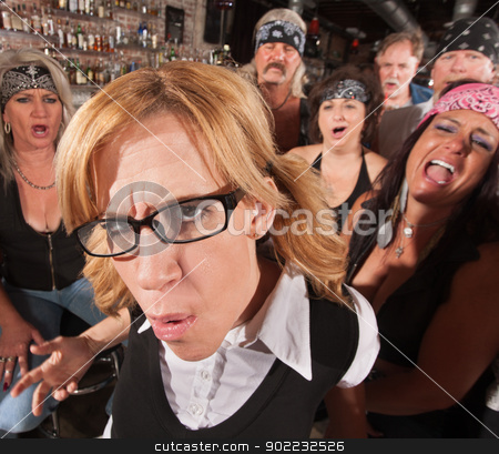 Annoyed Nerd with Laughing Gang Annoyed Nerd with Laughing Gang stock photo, Annoyed Caucasian female nerd with laughing motorcycle gang behind her by Scott Griessel