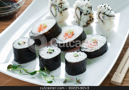 To use this stock image in your creative project, please select the size you need over to the right and click the "Add to Cart" button.
Your downloaded image will come with the Cutcaster watermark removed so don’t worry about the watermark you see on this page. Japanese Sushi stock photo, Selection of japanese sushi arranged with thyme on white plate by Tiramisu Studio