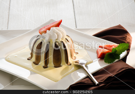 Chocolate pudding chocolate pudding stock photo, chocolate pudding with vanilla sauce strawberry and mint on white plate by p.studio66