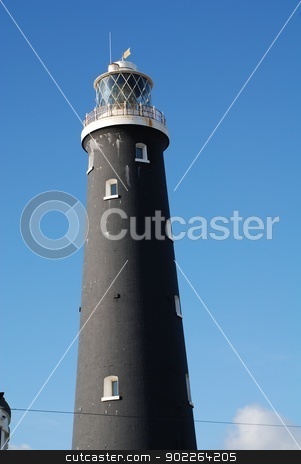 To use this stock image in your creative project, please select the size you need over to the right and click the "Add to Cart" button.
Your downloaded image will come with the Cutcaster watermark removed so don’t worry about the watermark you see on this page. Old Dungeness lighthouse, Kent, England stock photo, The old lighthouse at Dungeness in Kent, England. Opened in 1904, it was decommissioned in 1960. by newsfocus1