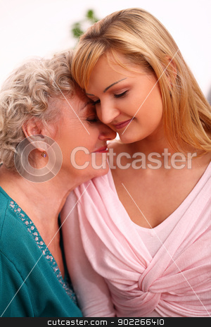 Happy elderly woman with granddaughter Happy elderly woman with granddaughter stock photo, Happy elderly woman with granddaughter at home by yekostock
