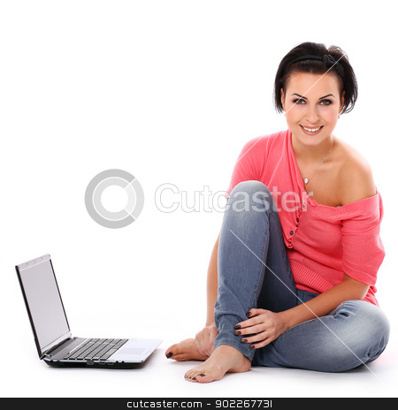 To use this stock image in your creative project, please select the size you need over to the right and click the "Add to Cart" button.
Your downloaded image will come with the Cutcaster watermark removed so don’t worry about the watermark you see on this page. Young happy woman with laptop stock photo, Young happy woman with laptop isolated over white background by yekostock